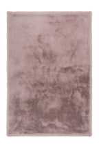 Zachtroze Cloud vloerkleed elegant uitgespreid, met zicht op de ronde lijnen en textuur