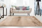 Gezellige woonkamer met het beige Eternelle vloerkleed als neutrale basis