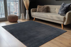 Antraciet Lushlyn vloerkleed in stijlvolle, moderne woonkamer