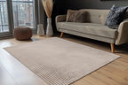 Taupe Lushlyn vloerkleed in warme, moderne woonkamer