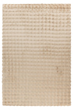 Beige Softedge vloerkleed mooi uitgespreid op een lichte houten vloer